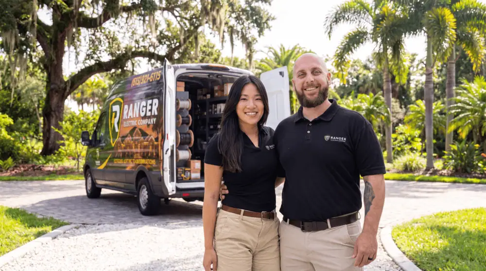 The Ranger Electric team in front of their branded service van